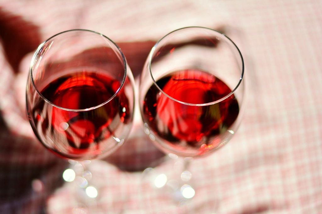 Wine glasses and bottles on the counter